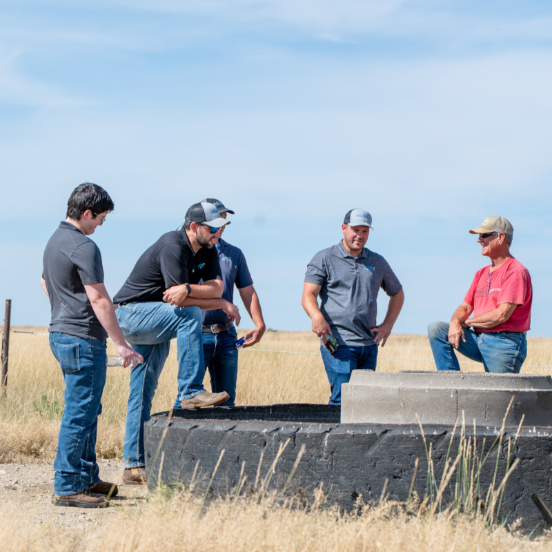 Growers team discussing on the field